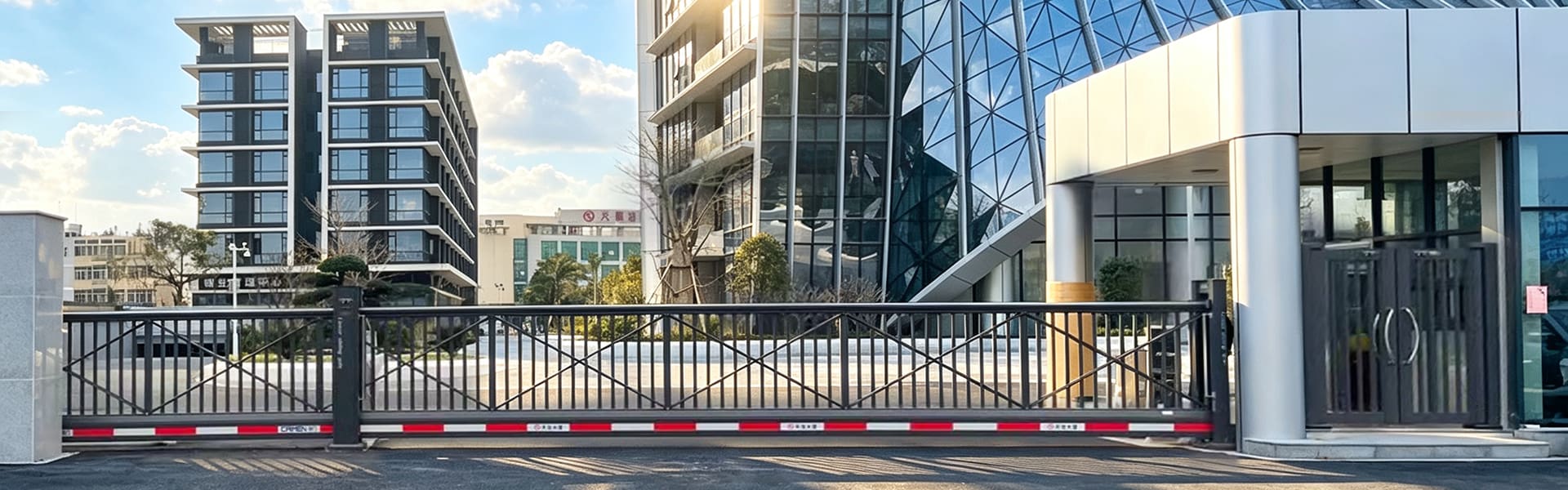 Cantilever sliding gate at a modern commercial entrance